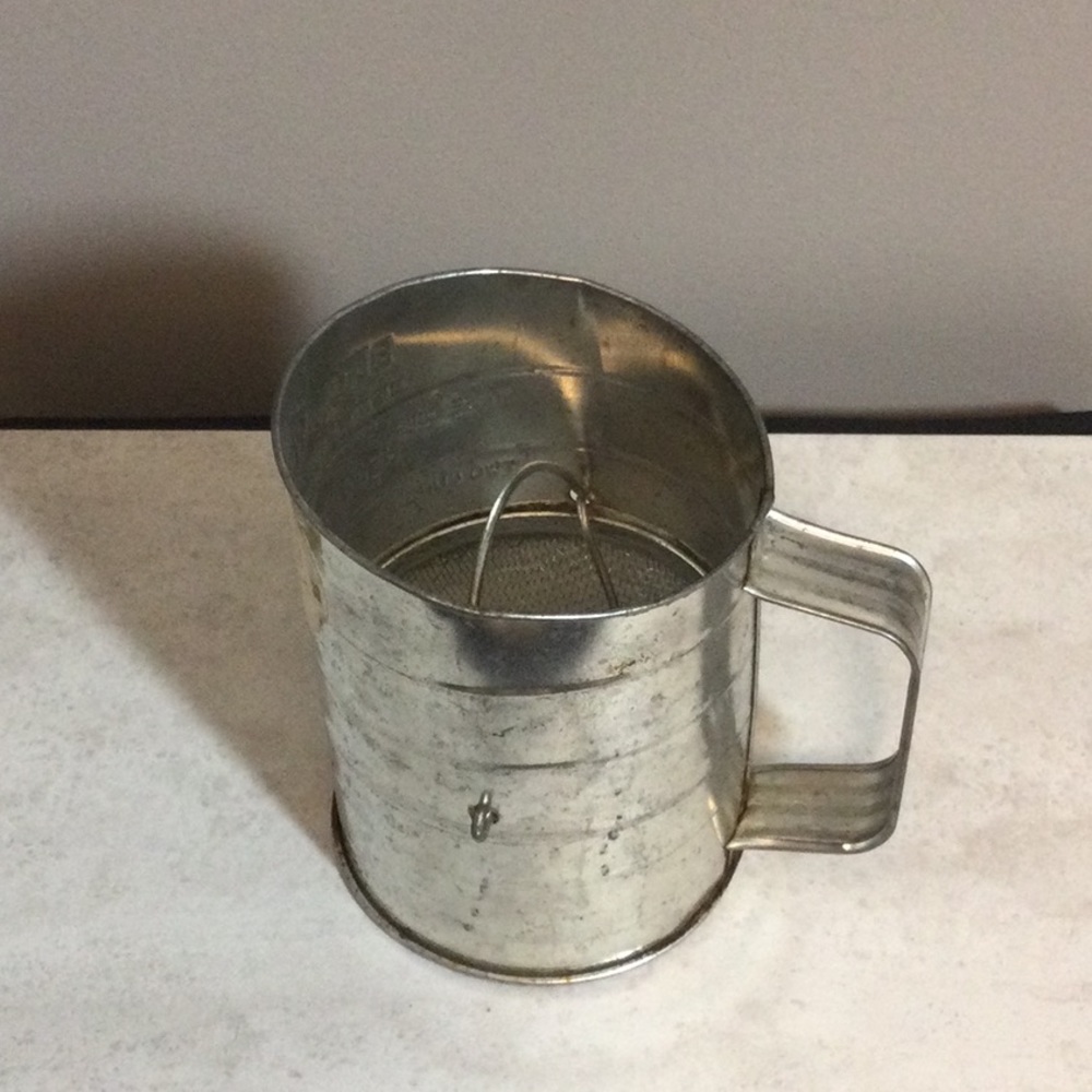 Antique Bromwells 3 cup metal sifter